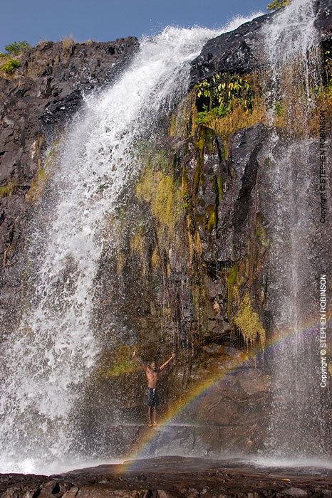 039_TZmN.7728V-Man-Under-Waterfall-&-Rainbow-N-Zambia