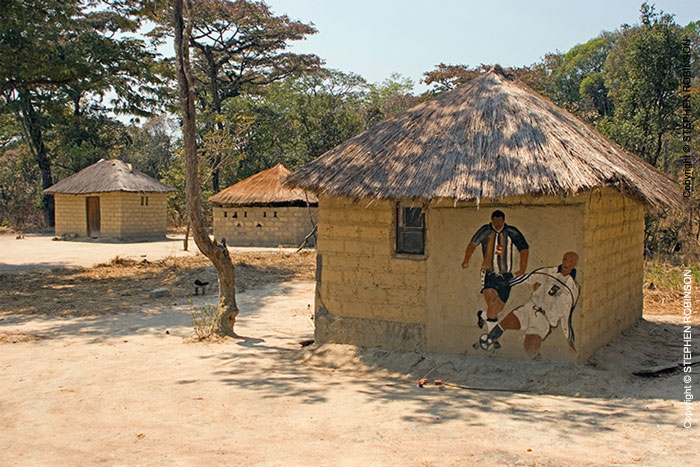 001_CZmA.8446-African-Painted-House-Football-Village