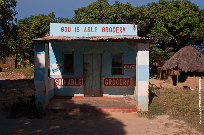 018_CZmA.1342-African-Sign-Art-God-is-Able-Grocery