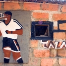 007_CZmA.8554-African-Painted-House-&-Owner-Football