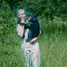 003_MApCG_15V-Jane-Goodall-carrying-young-chimpanzee