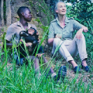 042_MApCG_48V-Jane-Goodall-with-African-sanctuary-worker-&-young-chimpanzee