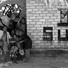 008_PZmL.7378BW-Family-&-Damaged-'Sun'-House