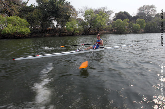 017_SZmR.0184-Rowing-on-Zambezi-Sculling-Champion-Dan-Arnold-at-speed