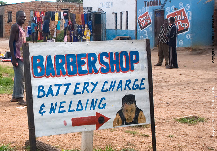 008_CZmA.3166-African-Sign-Art-Barbershop-Sign