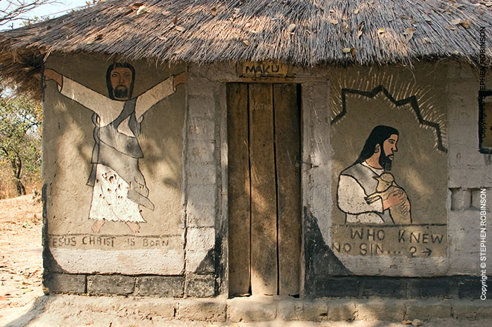 003_CZmA.8536-African-Painted-House-Jesus's Barbershop
